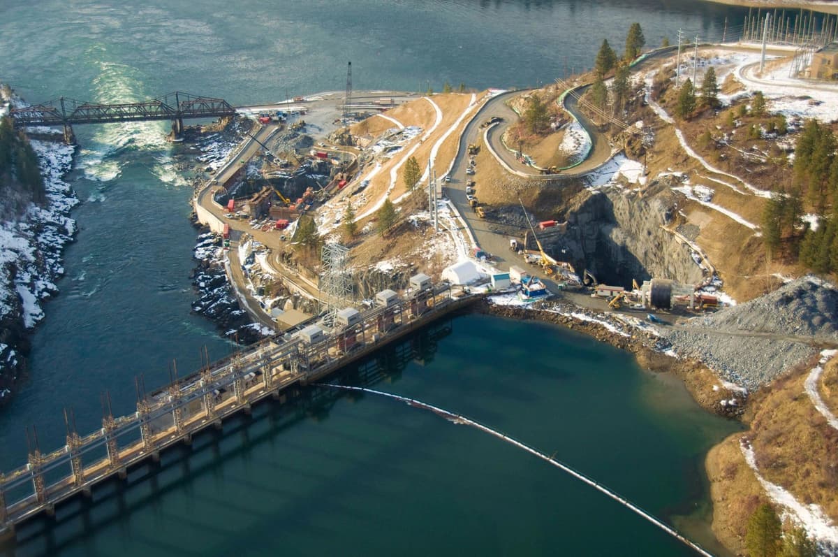 Paving equipment and a team of construction workers